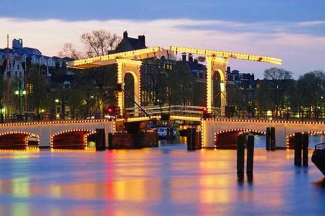 Tiny Houseboat On The Amstel River *