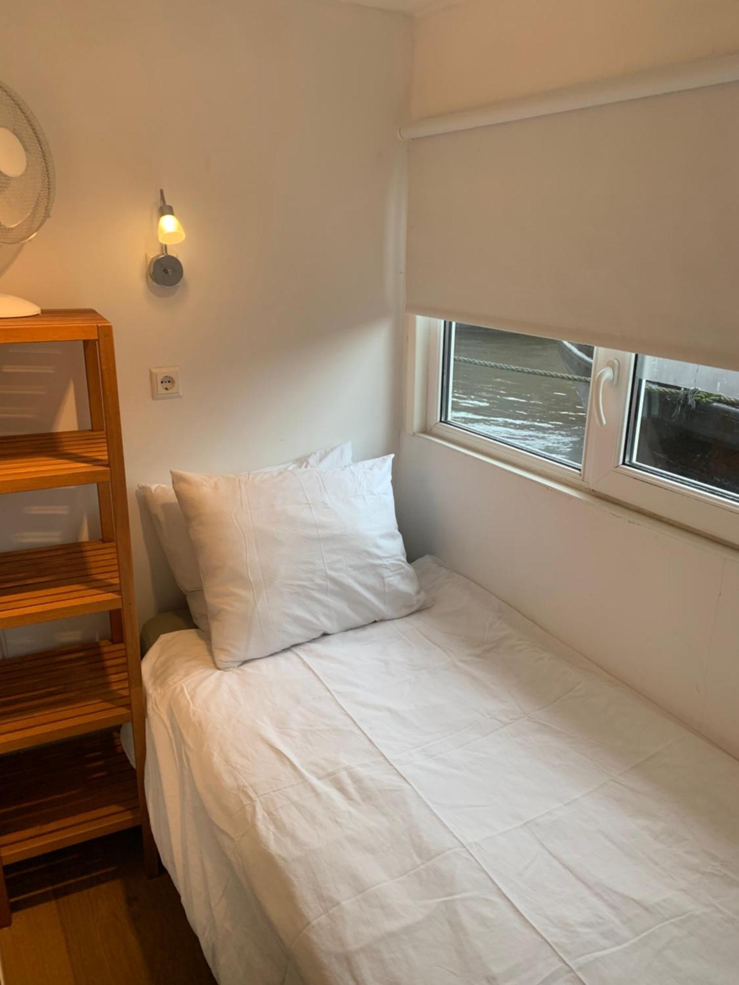 Tiny Houseboat On The Amstel River
