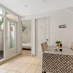Spacious Apartment In City Center With Private Patio