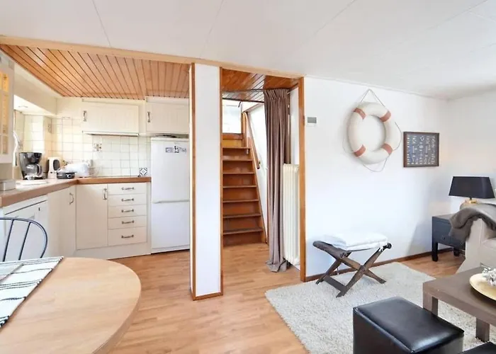 Houseboat Captain\'S Quarters In Harbour Amsterdam